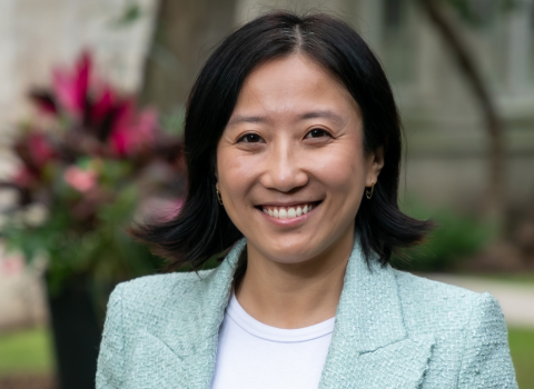 Sunny Yurasek headshot taken at Northwestern University campus in Chicago on a Fall day.